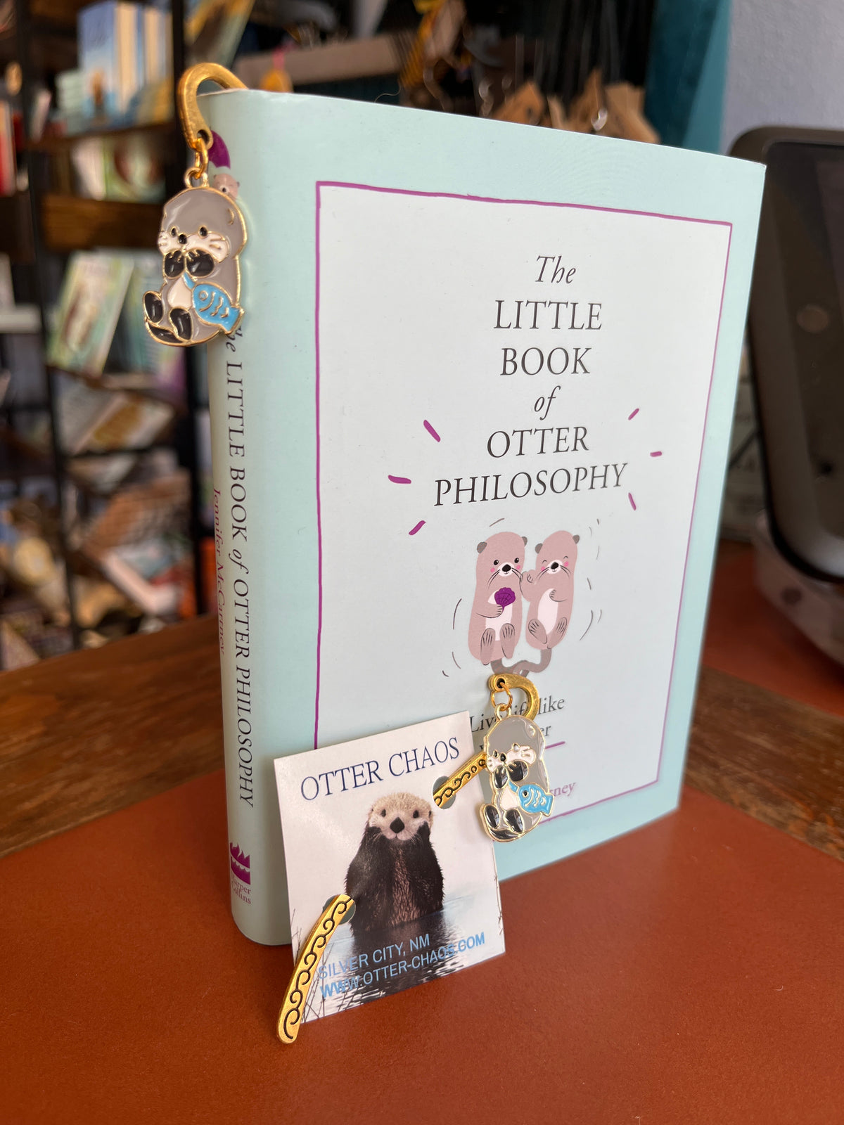 Metal bookmark with enameled Otter